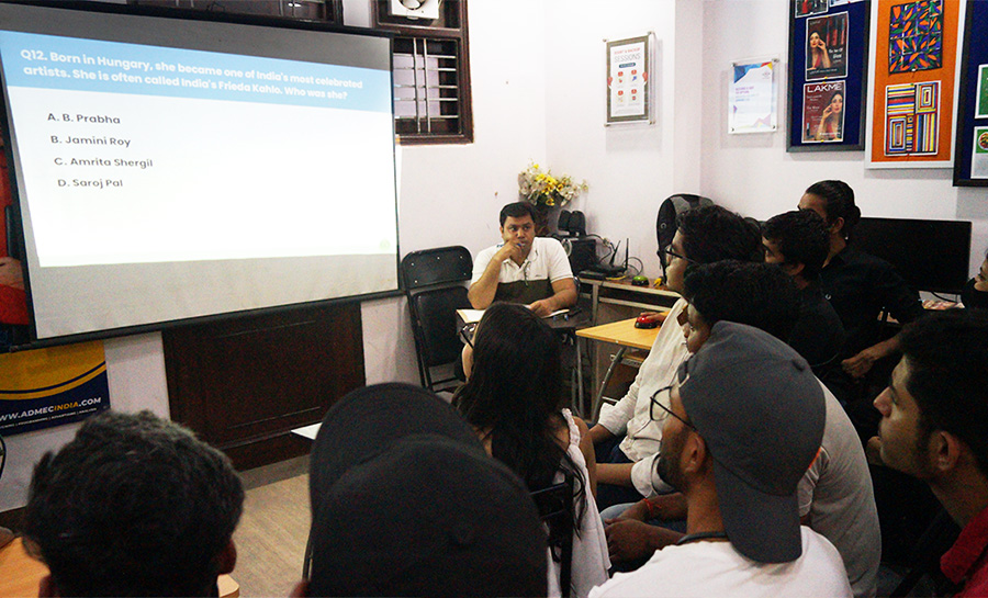 Students participating in graphic design quiz at ADMEC