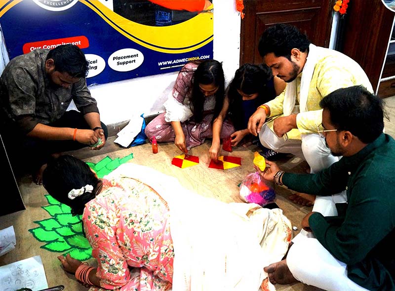 team c making rangoli at rangoli design competition 2024
